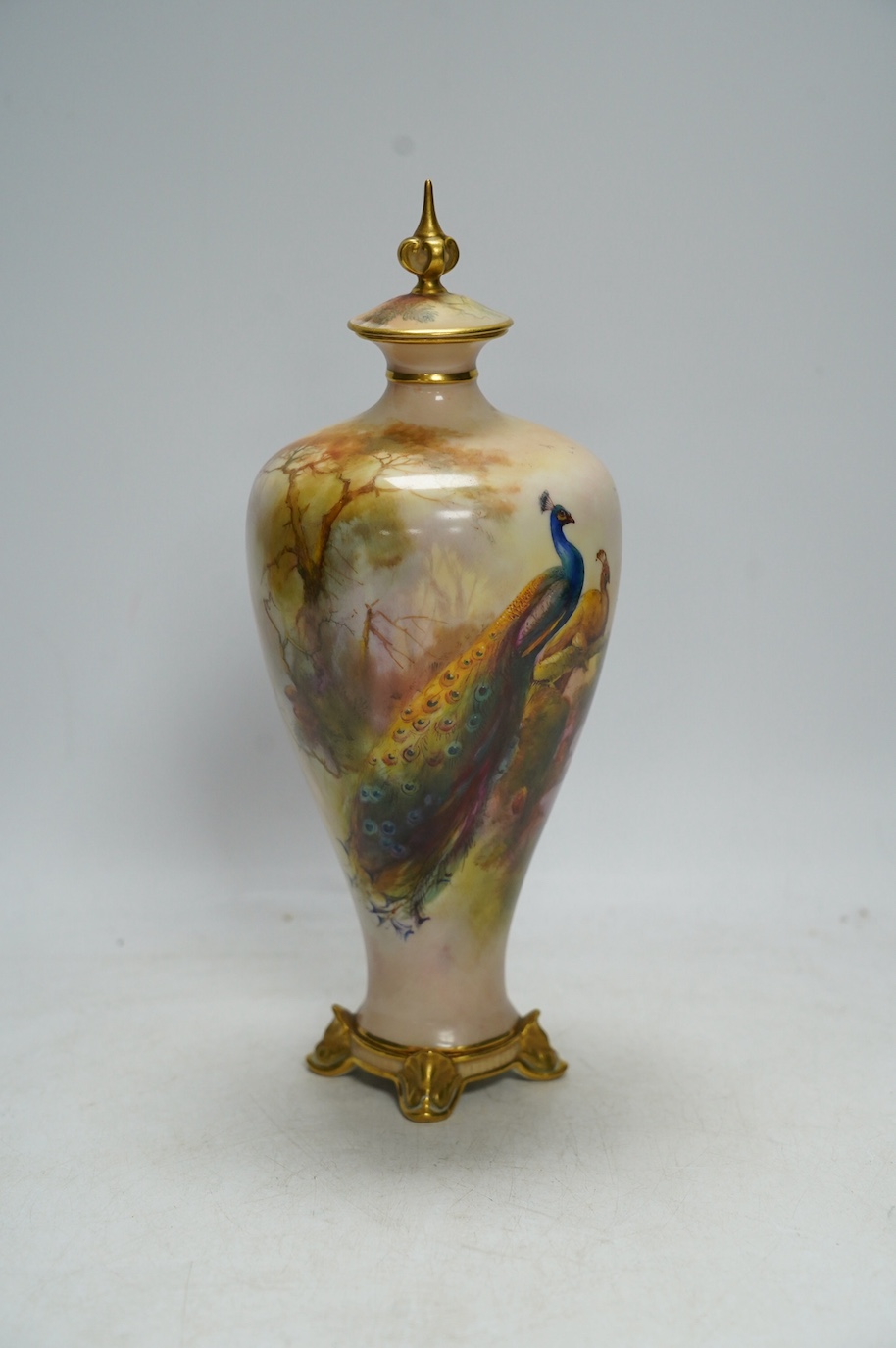 A Worcester vase and cover, painted with peacocks by J W Sedgley, model number 106, 25cm. Condition - good